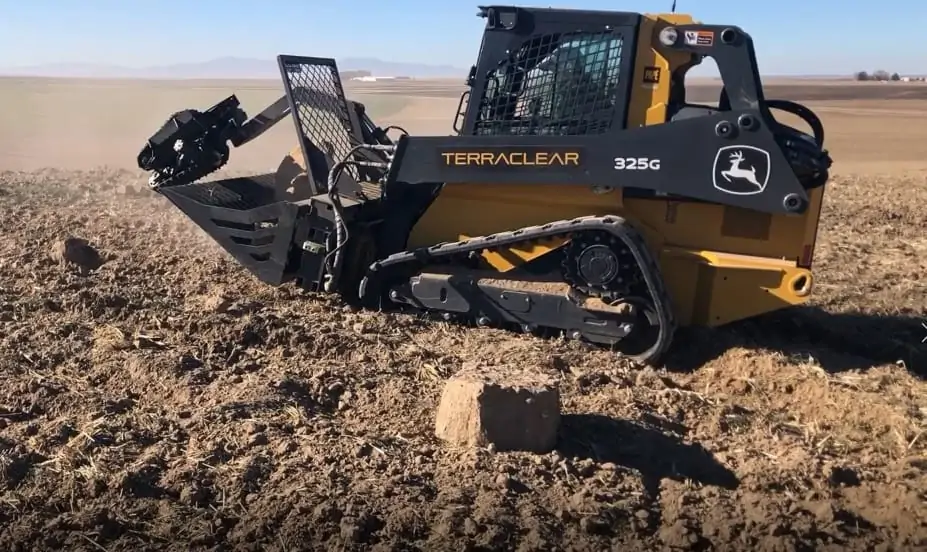 Robotic rock clearing vehicle