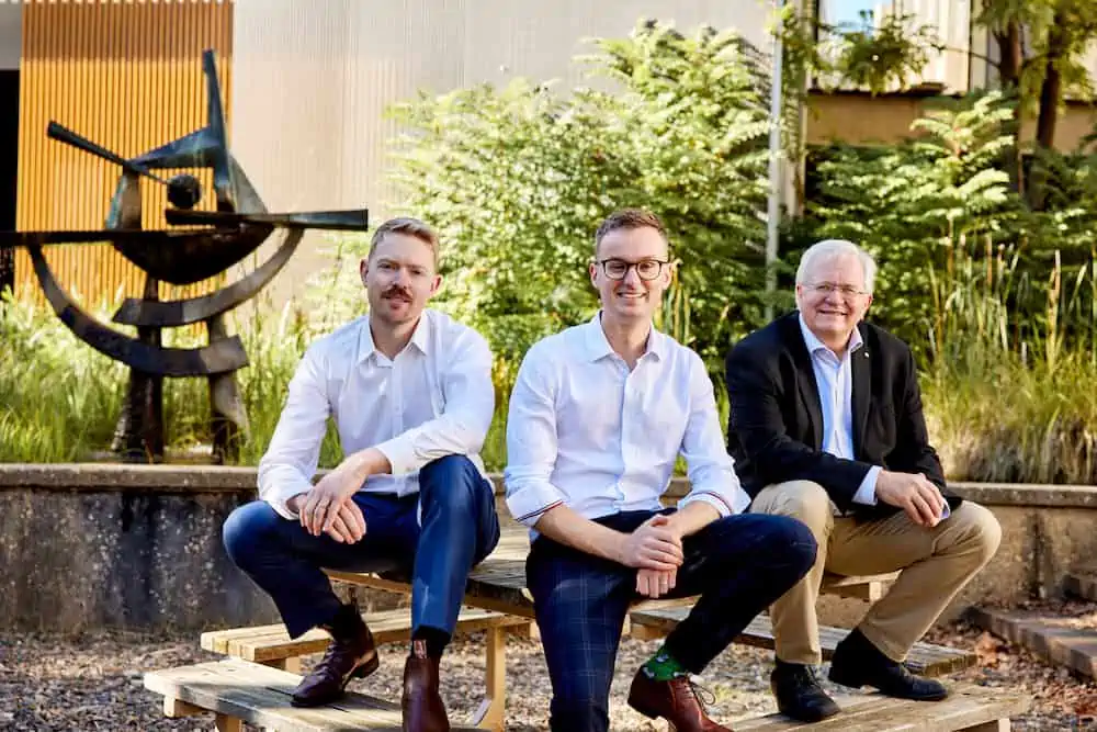 Vai Photonics Co-founders Lyle Roberts and James Spollard with ANU Vice Chancellor Brian Schmidt