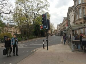 A typical city street with tree canopy obstructions