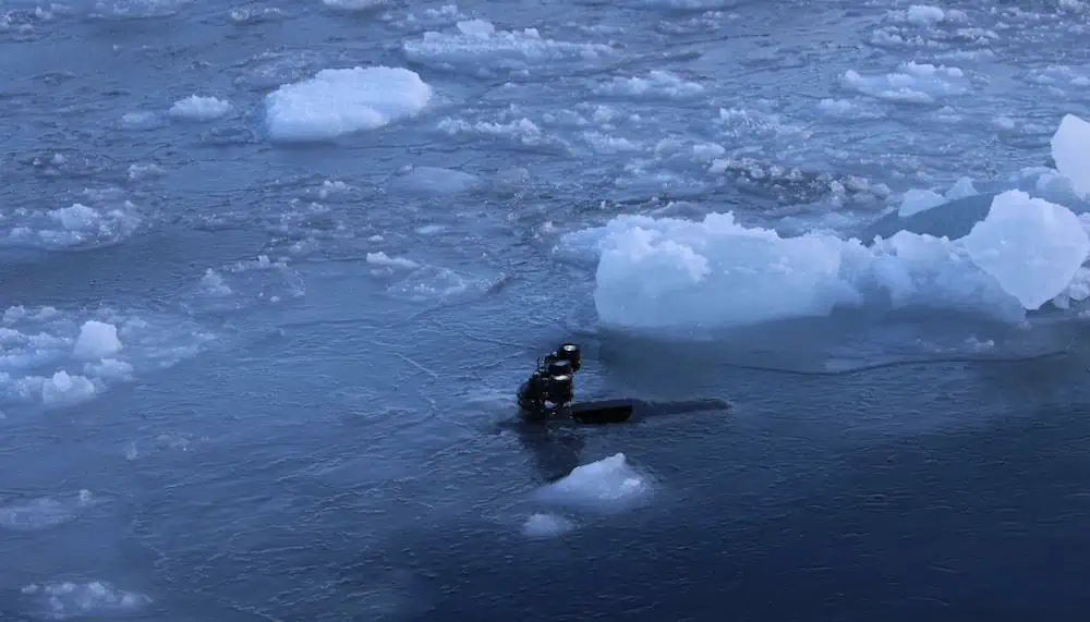 The Blueye X3 ROV diving in the water surface at Svalbard