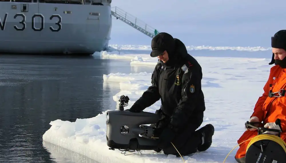 The Blueye X3 ROV with one of the Coast Guards vessels at Svalbard