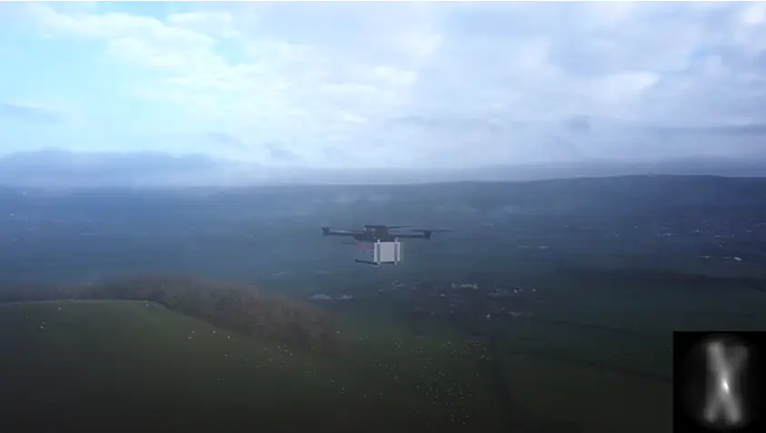 Airborne Cold Atom System Demonstrated on a Small Drone