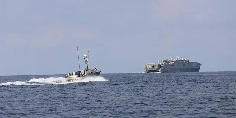 Cross-Domain Uncrewed-Uncrewed Teaming Successfully Completes Sensor-to-Shooter Exercise