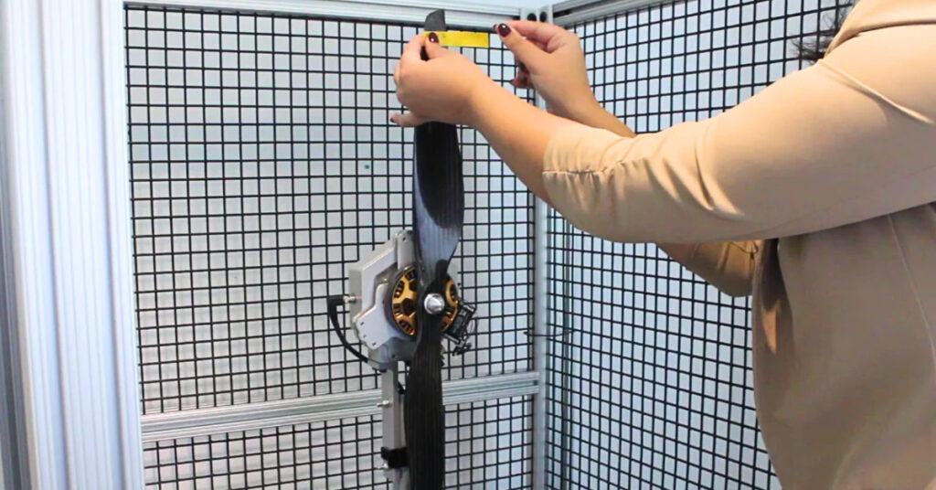Adding weight to a propeller blade with tape