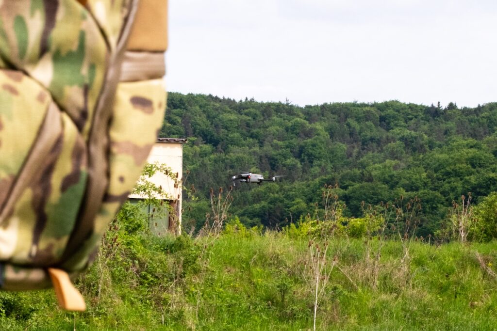 A U.S. Army Skydio X10D drone assigned to 3rd Infantry Division lowers to the ground after being taken over and grounded by the EnforceAir 2 cUAS Software-Defined Radio (SDR) Drone Detector during Combined Resolve 25-02. Image credit: U.S. Army photo by Spc. Hunter Carpenter