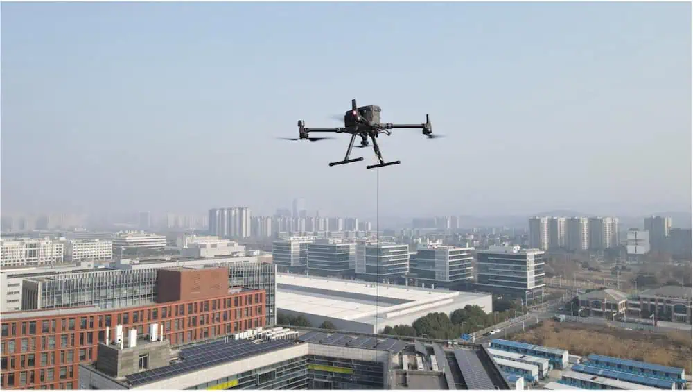 Tethered Drone Power Stations for Persistent UAV Operations