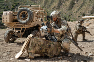 A soldier prepares to deploy PDW drone.