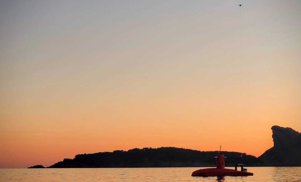 Tethered DroneBox Integrated with Unmanned Surface Vessel