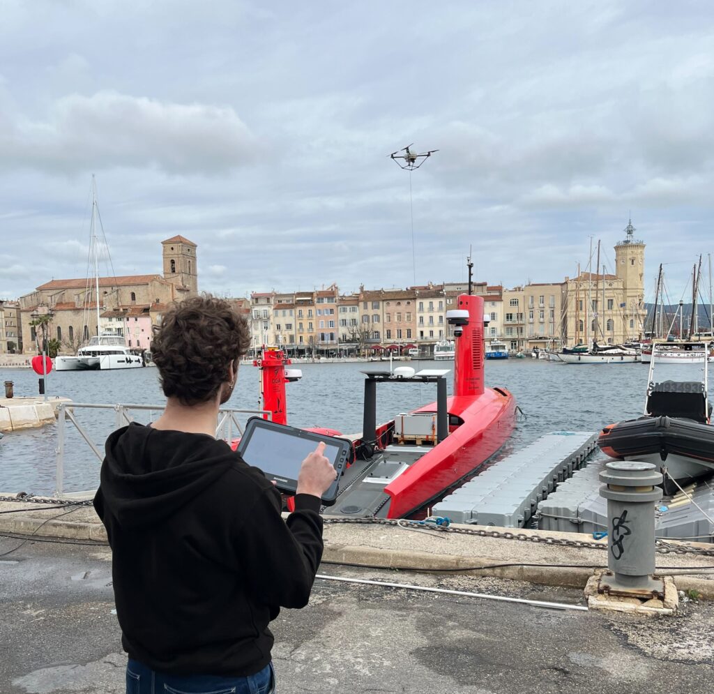 Tethered DroneBox Integrated with Unmanned Surface Vessel