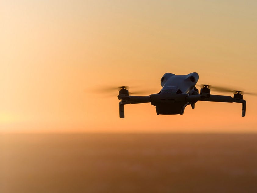 Compact Resilient Navigation System for Small Drones Demonstrated