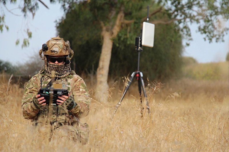 Adaptive SDR Networking: Tactical Communications in Contested Environments