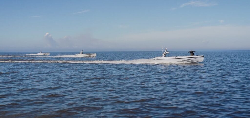 Scaling Autonomous Naval Fleets With Tactical Surface Vessels